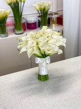 Wedding bouquet of white calla lilies